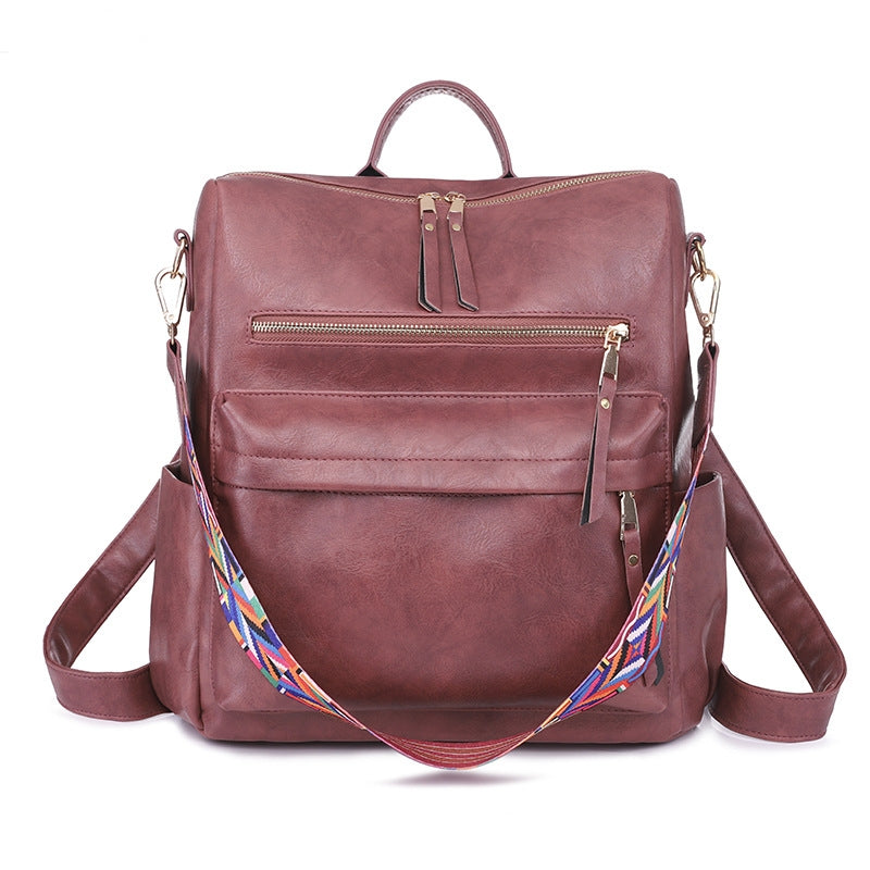 burgundy womens pu travel backpack with front zipper storage and detachable woven shoulder strap