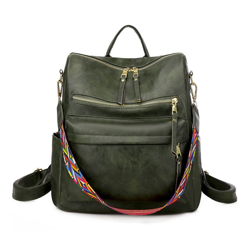 dark green pu womens travel backpack with multiple front zipper pockets and detachable patterned shoulder strap