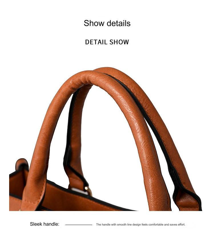 close up of brown pu tote bag showing rounded padded top handles and stitched handle construction