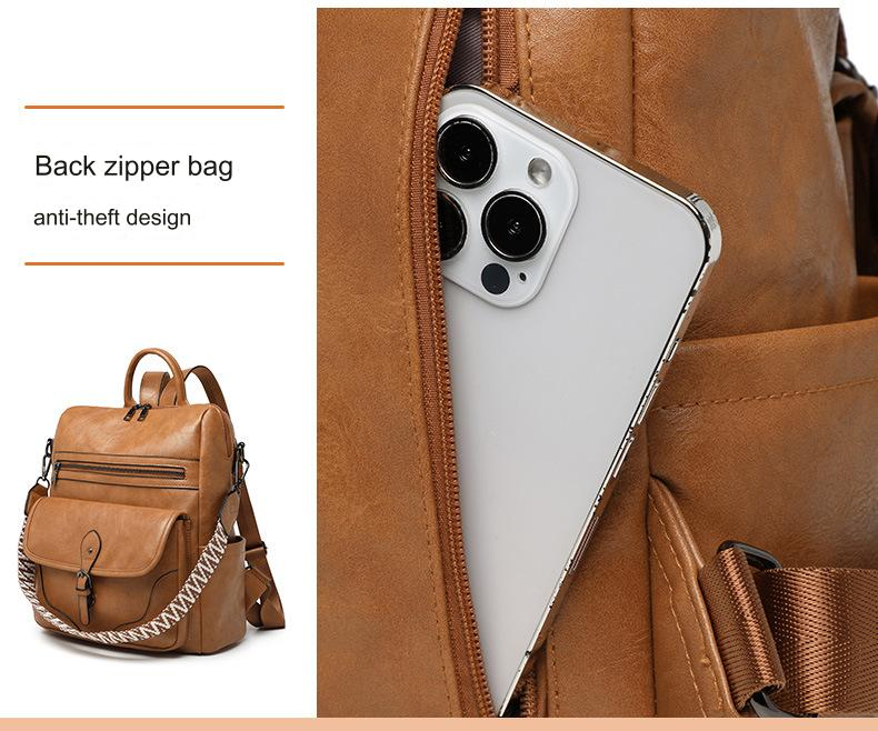 brown women's backpack rear concealed zipper pocket holding a smartphone for close-to-body storage