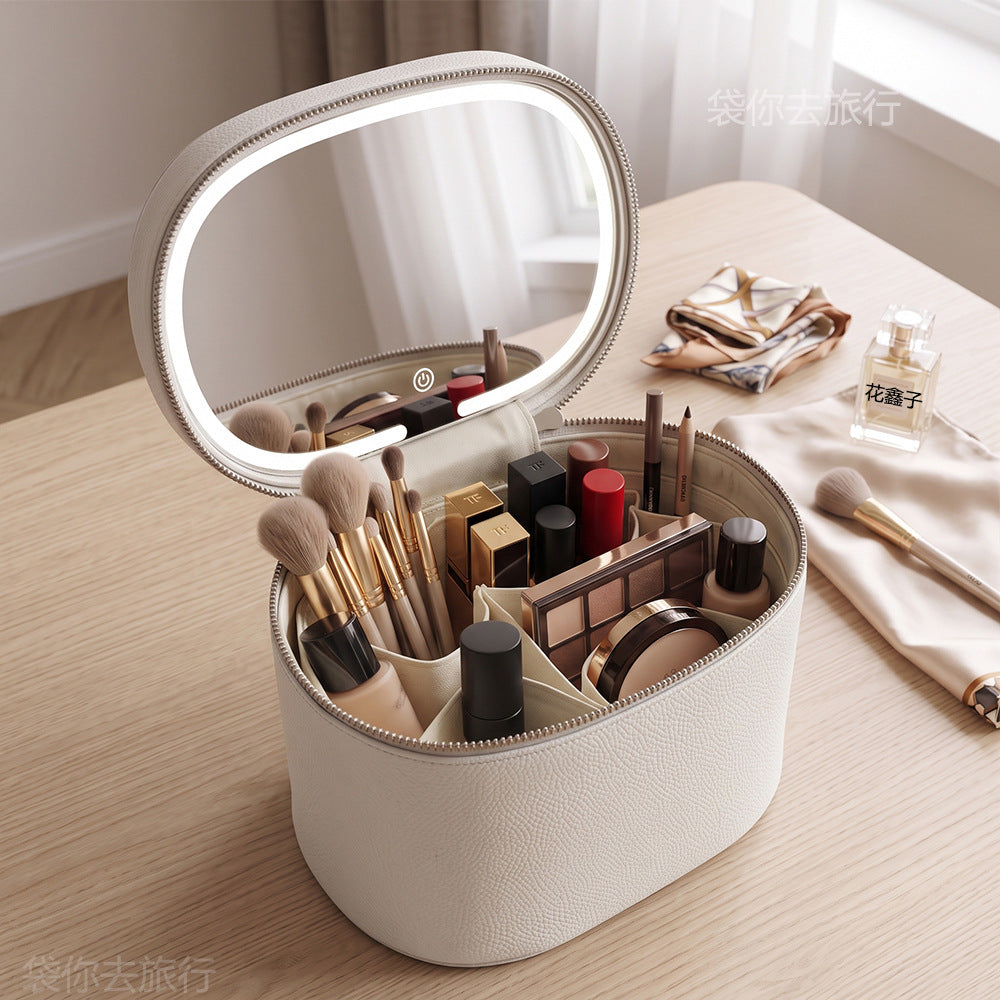 beige makeup brush organizer case with divided interior lipstick holders and open mirror lid