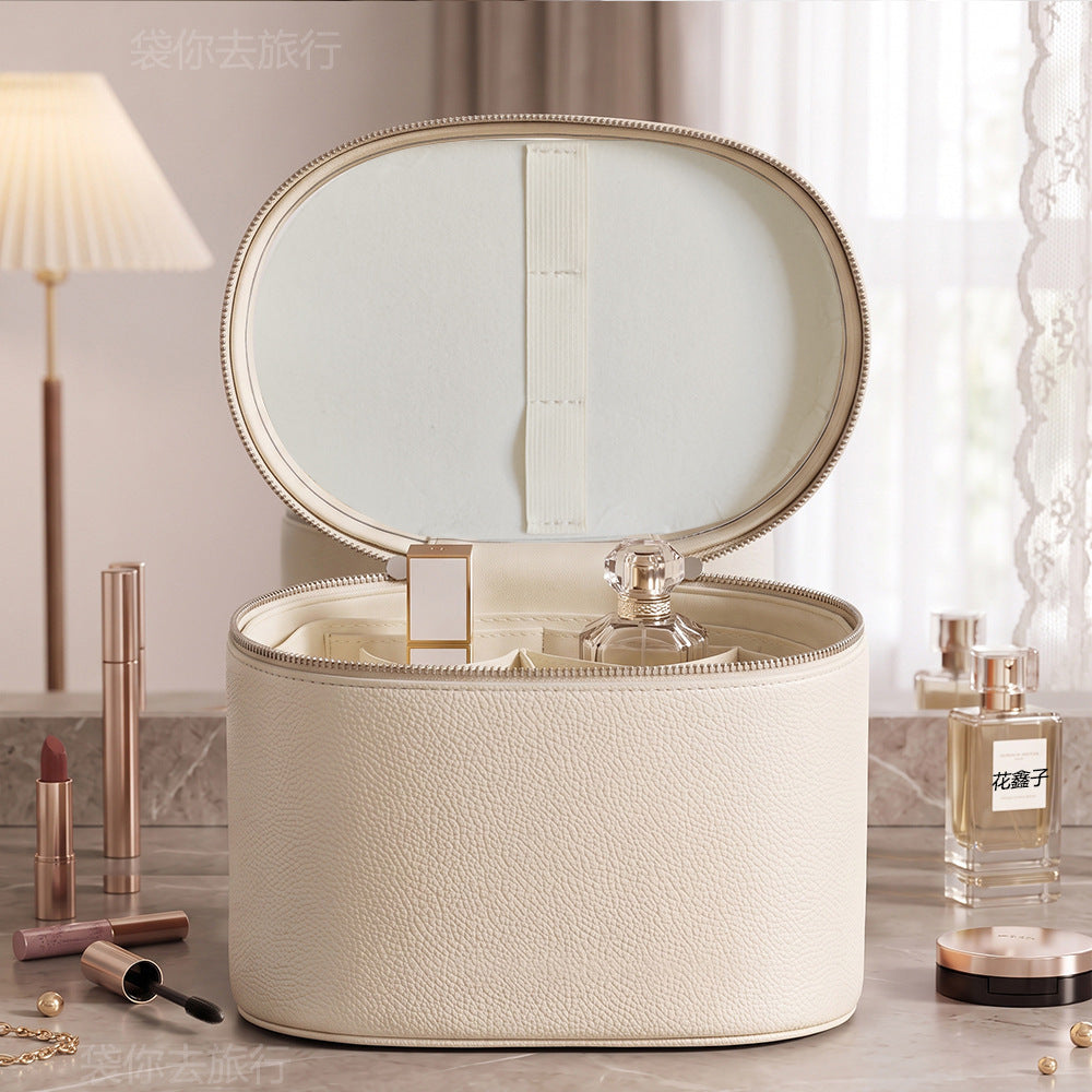 beige structured makeup organizer case with plain inner lid and organized compartments without a mirror