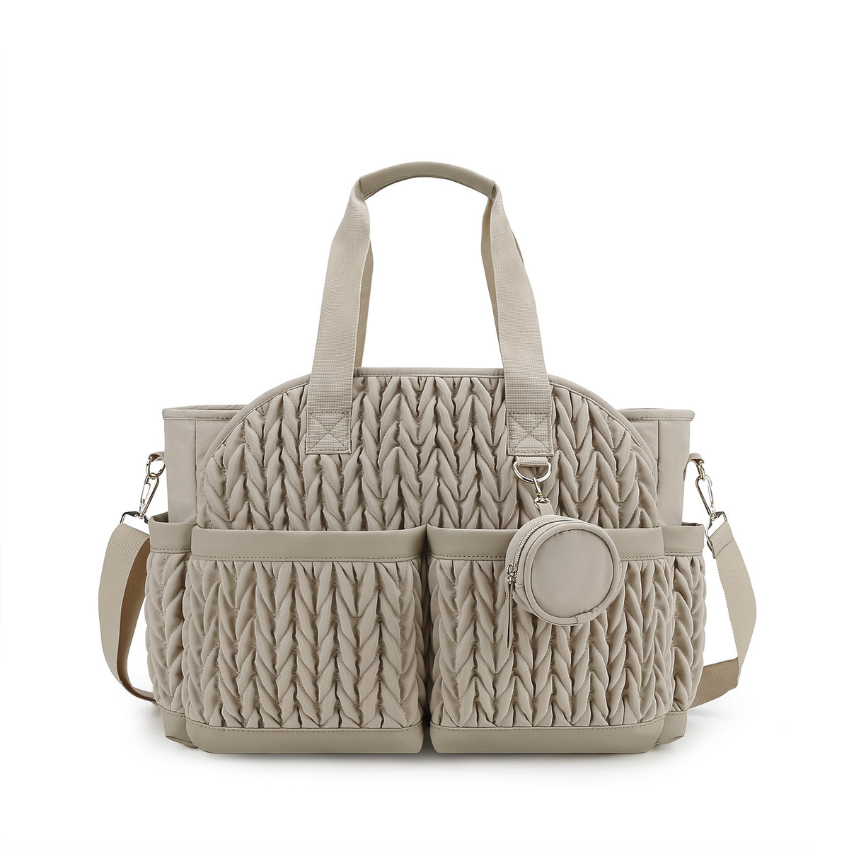 beige baby diaper bag tote with quilted exterior pockets and shoulder strap