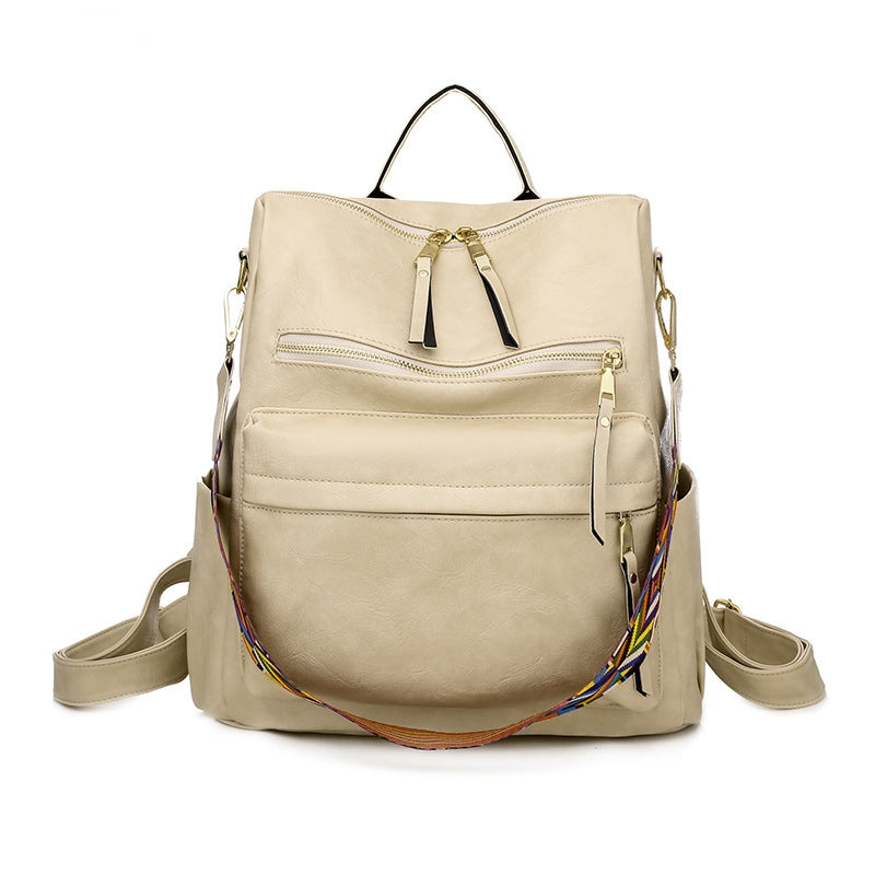 beige womens pu convertible backpack with front zippered compartments and adjustable shoulder straps