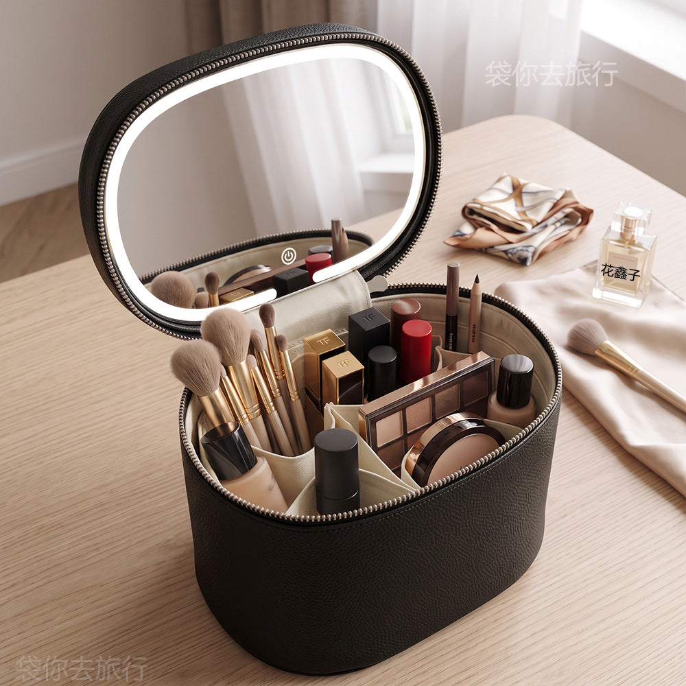 black structured makeup brush bag with open lid mirror and upright brush compartments