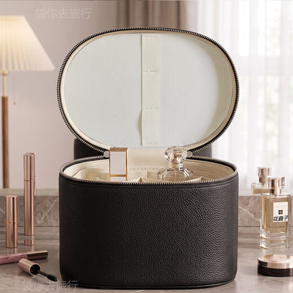 black makeup organizer case shown open with plain inner lid and divided interior storage