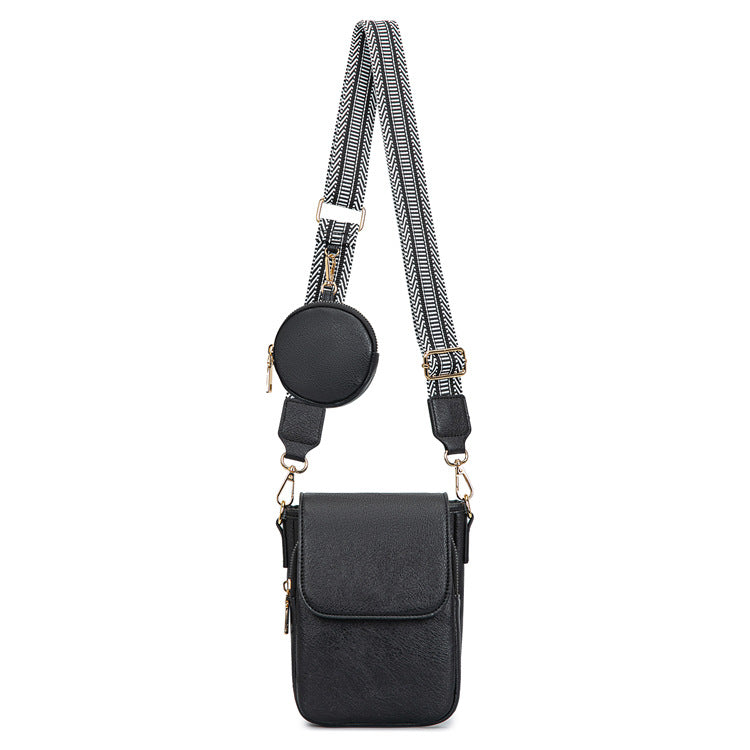 black pu crossbody phone bag with magnetic front flap dark round coin purse and adjustable black patterned strap
