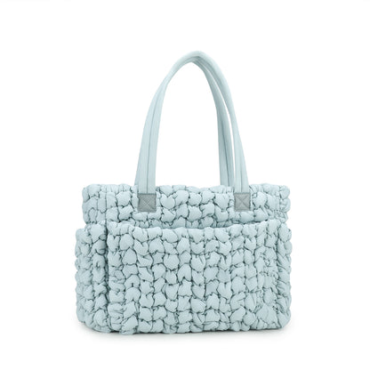 blue-green gathered quilted diaper tote bag with long handles and organized inner compartments