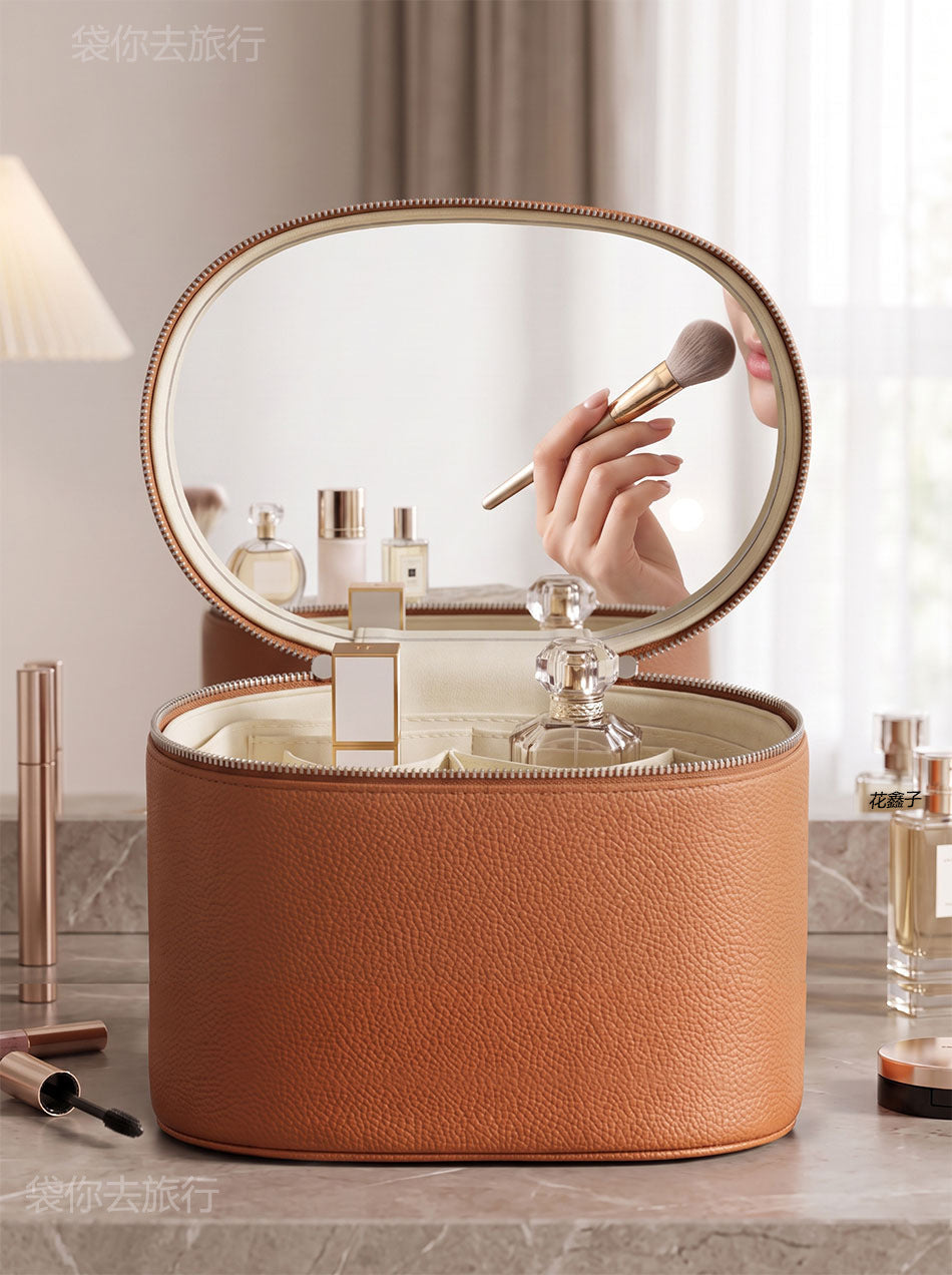brown makeup organizer case with open top showing light-colored inner lining and divided storage compartments