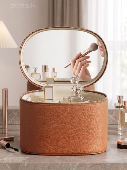 brown makeup organizer case with open top showing light-colored inner lining and divided storage compartments