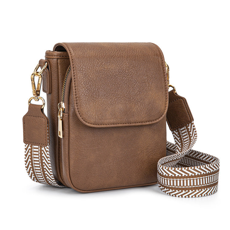 brown small crossbody bag with flap front zipper pocket patterned shoulder strap and detachable round coin purse