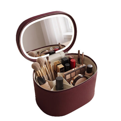 burgundy makeup organizer case with open oval mirror brush holders and divided compartments