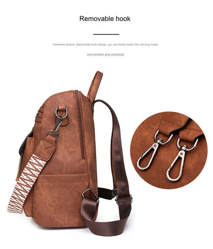 brown convertible pu backpack side view with detachable metal strap hooks side pocket and adjustable shoulder straps