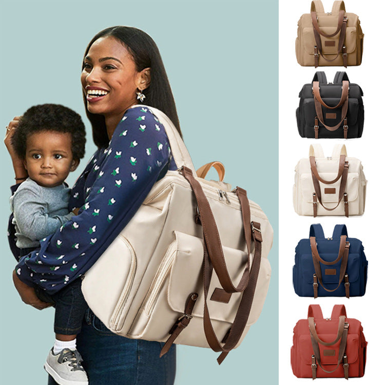 custom convertible diaper bag tote backpack shown on a parent with five color options and adjustable shoulder straps