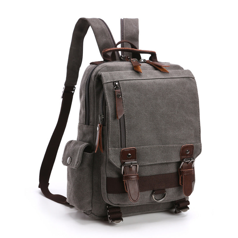 gray canvas rucksack backpack with adjustable shoulder straps