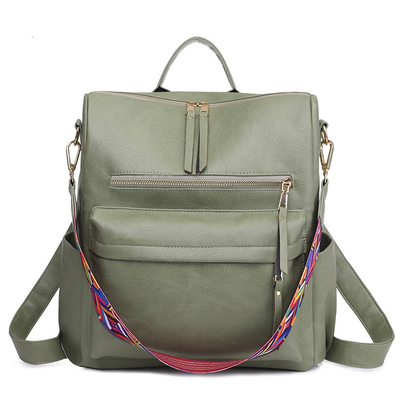 gray pu womens backpack with top double zipper front storage pockets and patterned shoulder strap