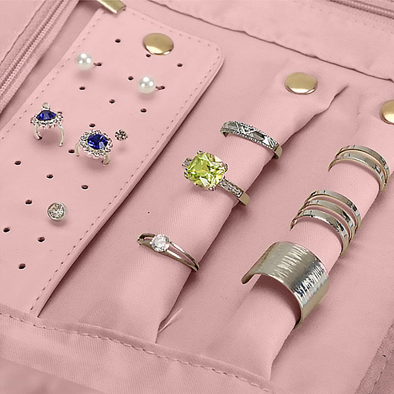 jewelry organizer with ring rolls and earring storage grid