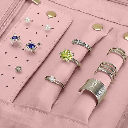 jewelry organizer with ring rolls and earring storage grid