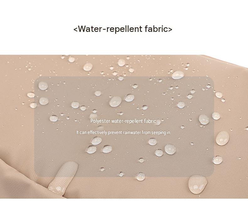water droplets beading on the khaki coated surface of the mesh pocket waist bag