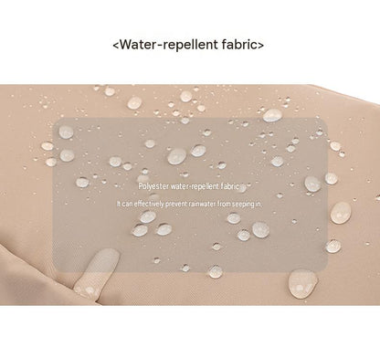 water droplets beading on the khaki coated surface of the mesh pocket waist bag