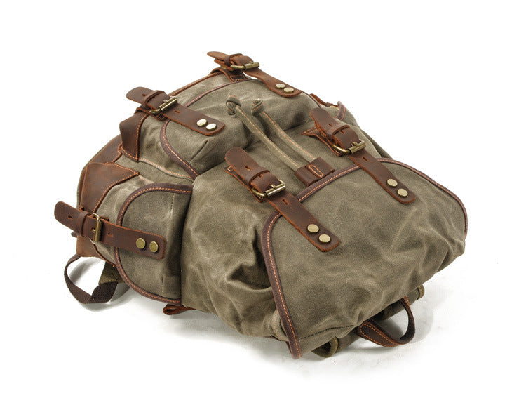 large capacity canvas travel backpack with spacious storage compartment
