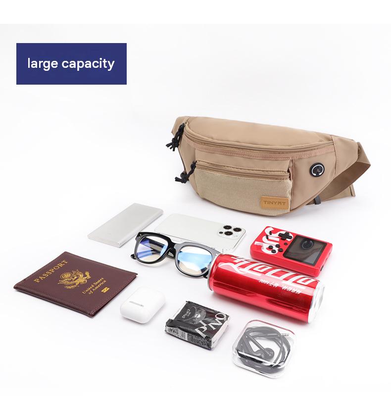 large capacity waist pack bag shown with phone passport glasses and daily accessories