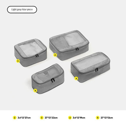 light gray four piece compression packing cube set for modular travel storage