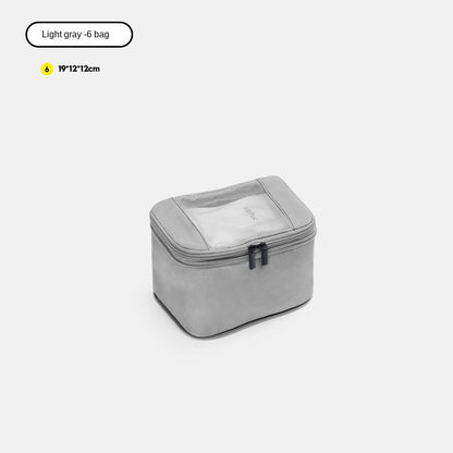 light gray no 6 small packing cube measuring 19 x 12 x 12 cm for small travel items