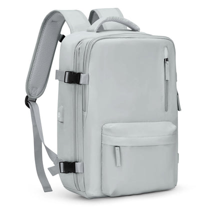 light gray travel backpack with breathable padded back panel shoulder straps and compression buckles