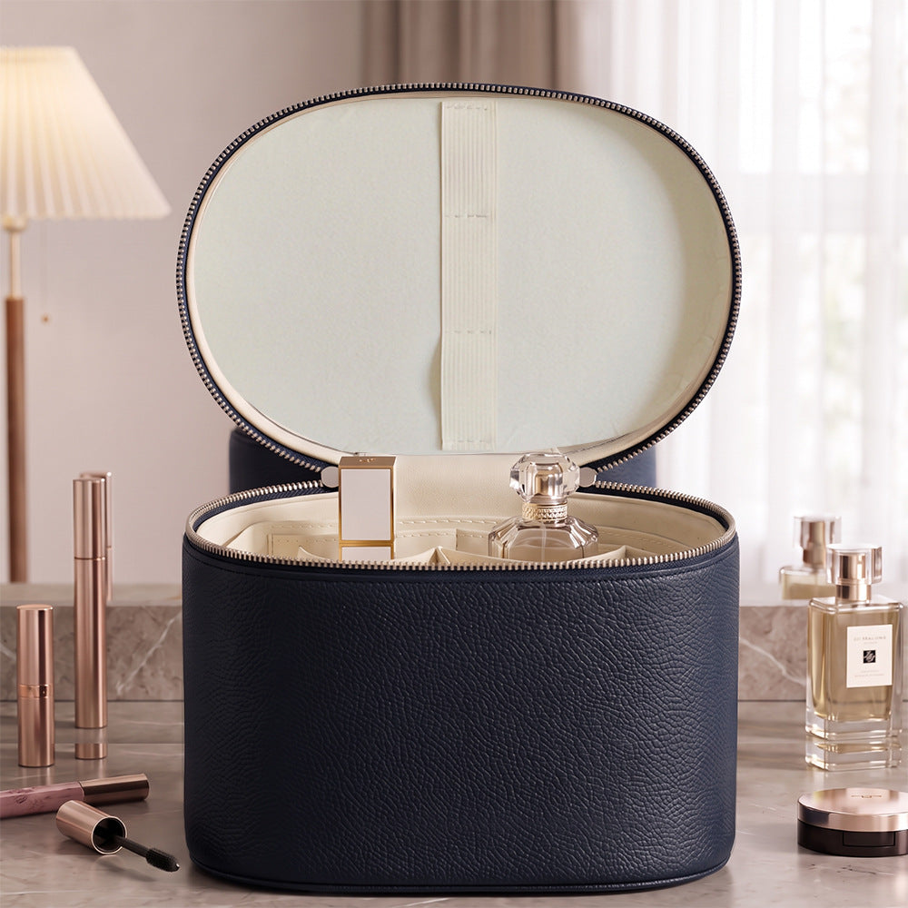 navy blue makeup organizer case without mirror showing open lid and interior storage sections
