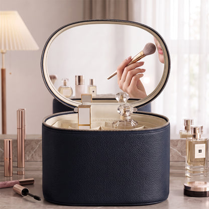 navy blue makeup organizer case with oval mirror lid and structured zippered body