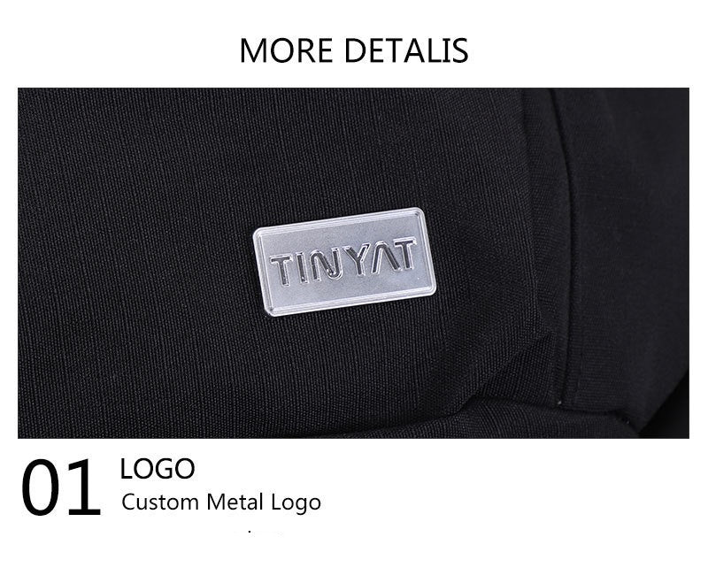 close up of rectangular silver metal logo plate on black nylon waist bag showing customizable branding position