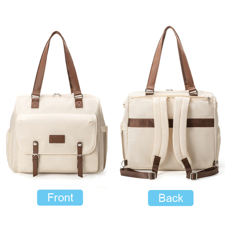 off-white convertible diaper tote backpack front and rear views showing flap organizer brown straps and luggage pass-through sleeve