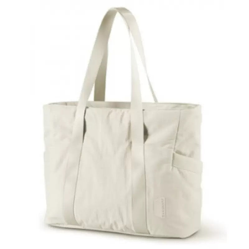 off white travel tote bag with long shoulder handles side pockets and front storage panel