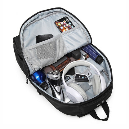 organized laptop backpack interior with divided storage for headphones bottle phone wallet and daily essentials