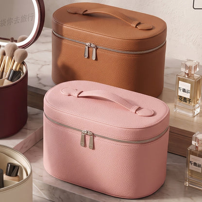pink and brown structured makeup organizer cases with top handles and zippered lids