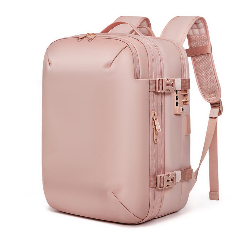 pink expandable backpack side view with 5 cm expansion zipper compression straps and travel hardware