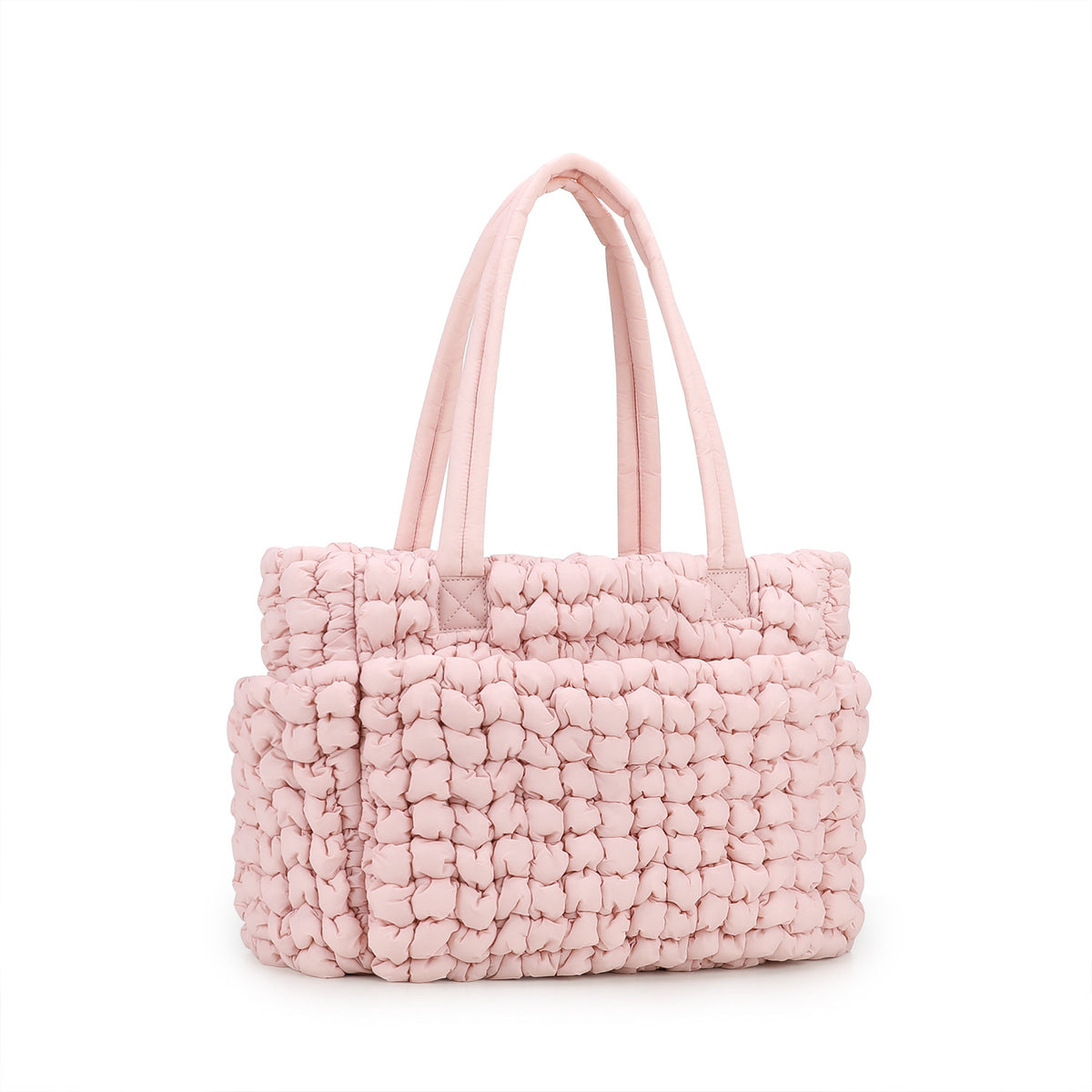 pink puffy quilted diaper tote bag with organized interior and long padded carry handles