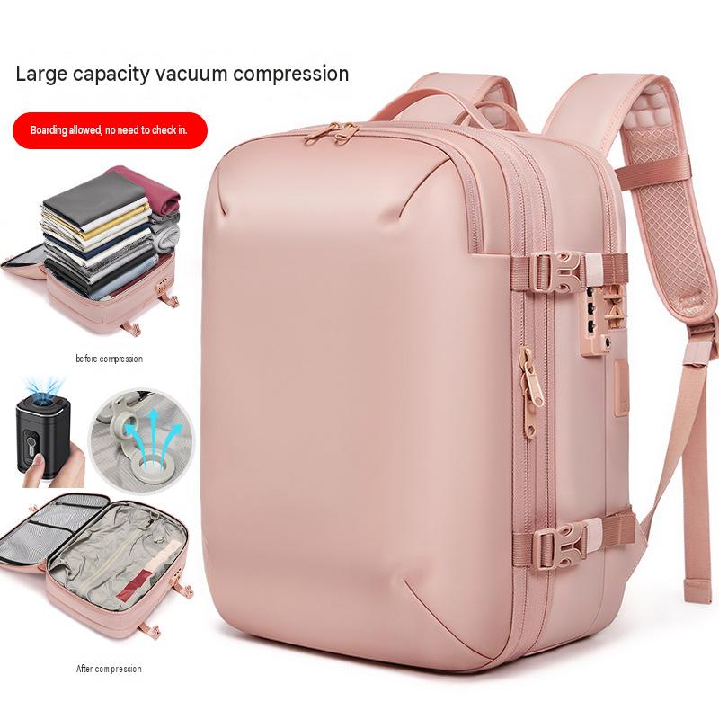 pink vacuum compression travel backpack with expandable structure side compression straps and air exhaust valve