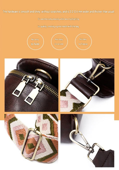 close up details of brown pu sling bag showing dual zipper pulls metal swivel clips adjustable strap buckle and woven webbing