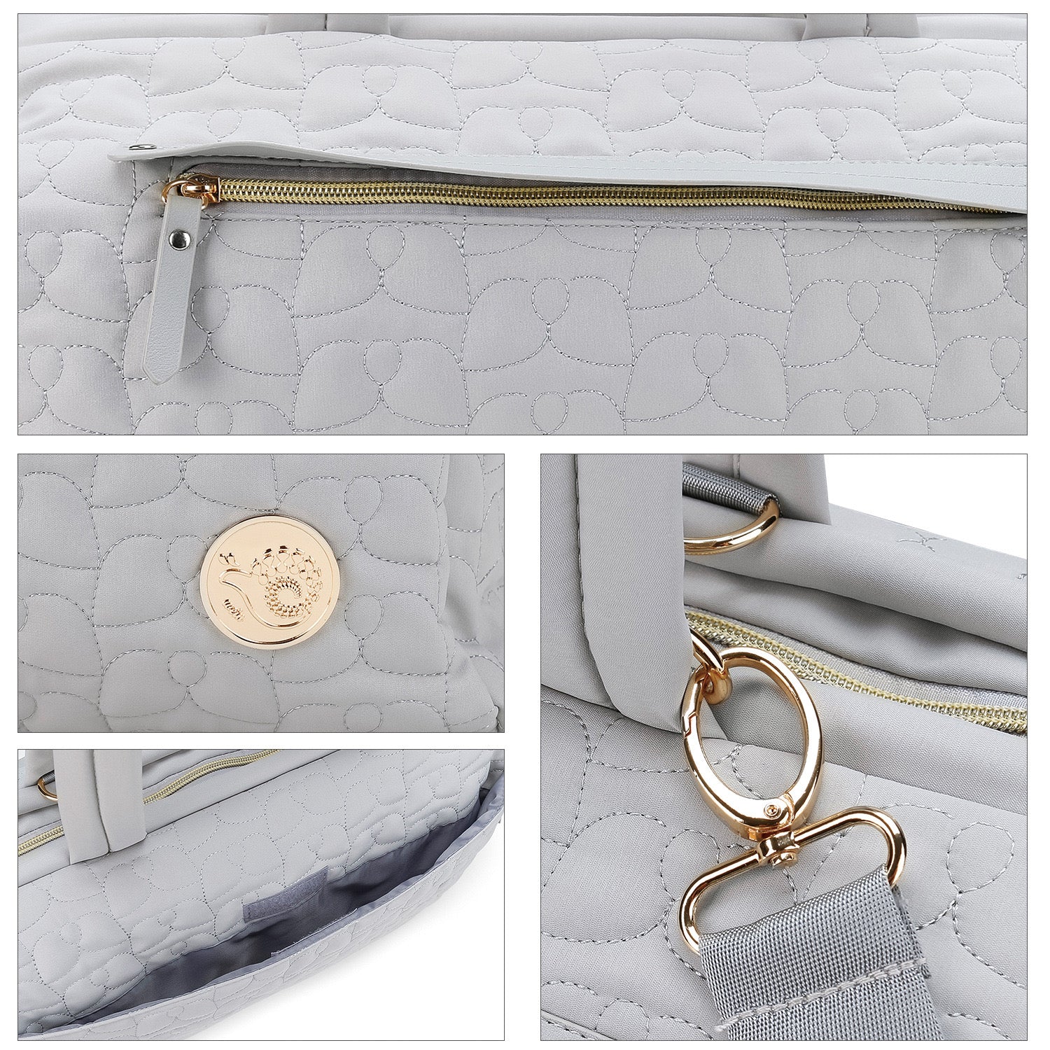 quilted diaper bag with premium zipper and strap hardware details