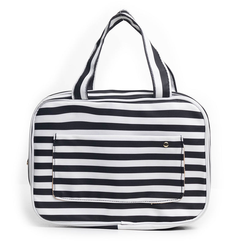 striped black makeup bag with quilted fabric for cosmetic storage
