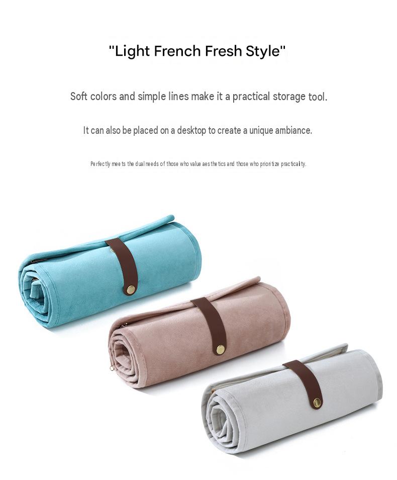 three color roll up jewelry organizer collection in light blue powder brown and greige with contrasting brown closure straps