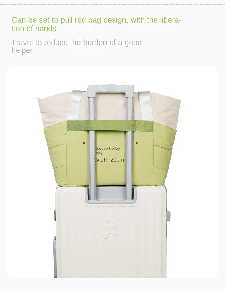 travel tote bag with 20 cm rear luggage sleeve fitted over suitcase handle