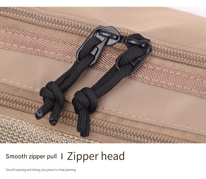 waist pack bag zipper detail with black rope pull tabs for easy opening