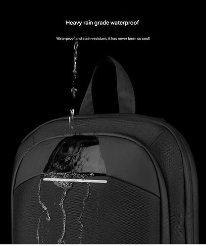 water resistant business laptop backpack exterior shown under running water