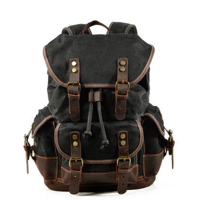 black canvas leather backpack with vintage outdoor style and leather straps
