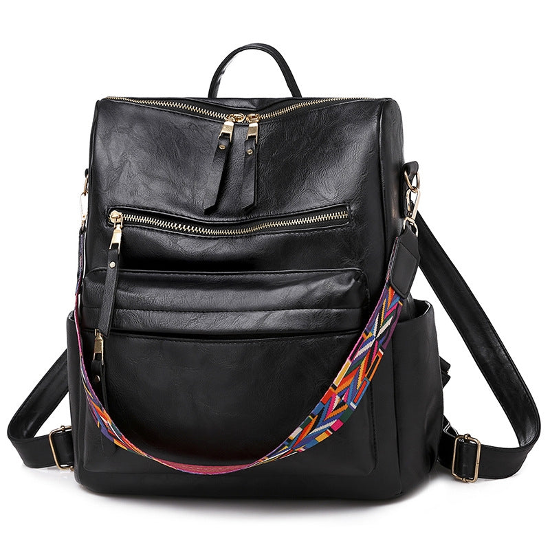 black pu convertible womens backpack with front zipper compartments top handle and detachable woven shoulder strap