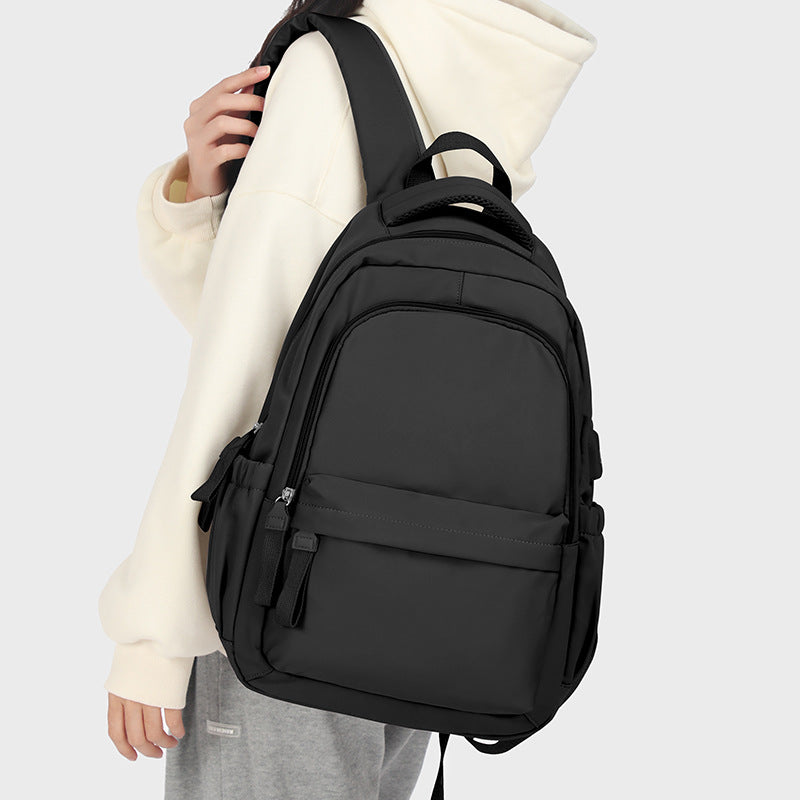 black school backpack with laptop compartment