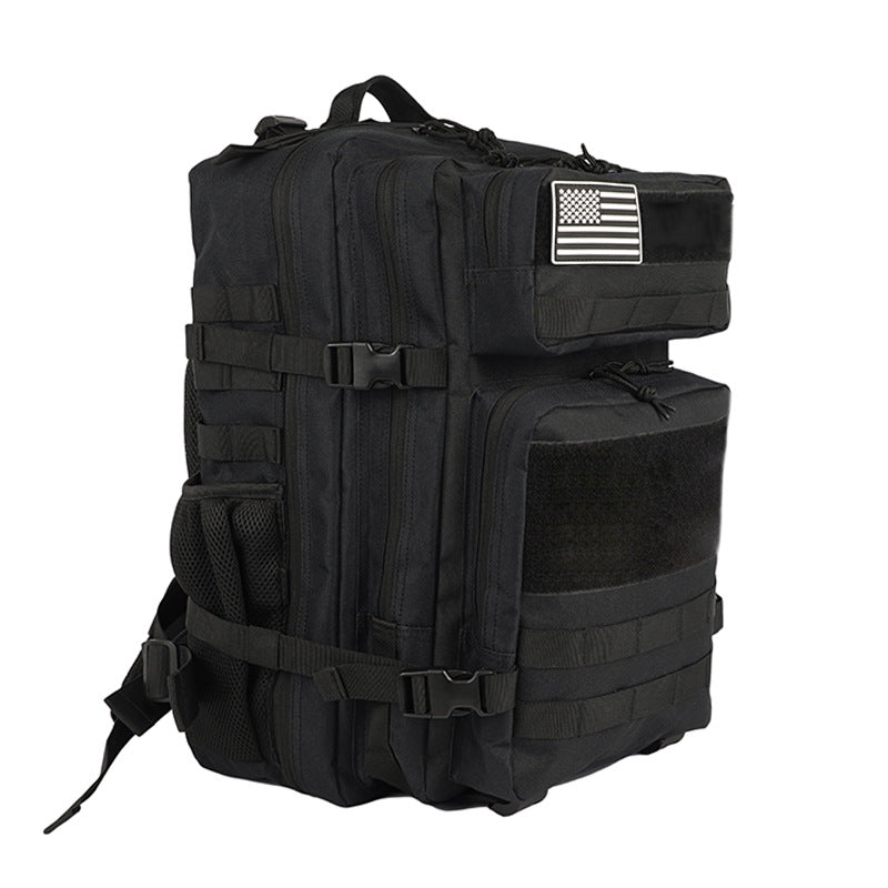 black tactical backpack front view with molle system and multiple storage pockets